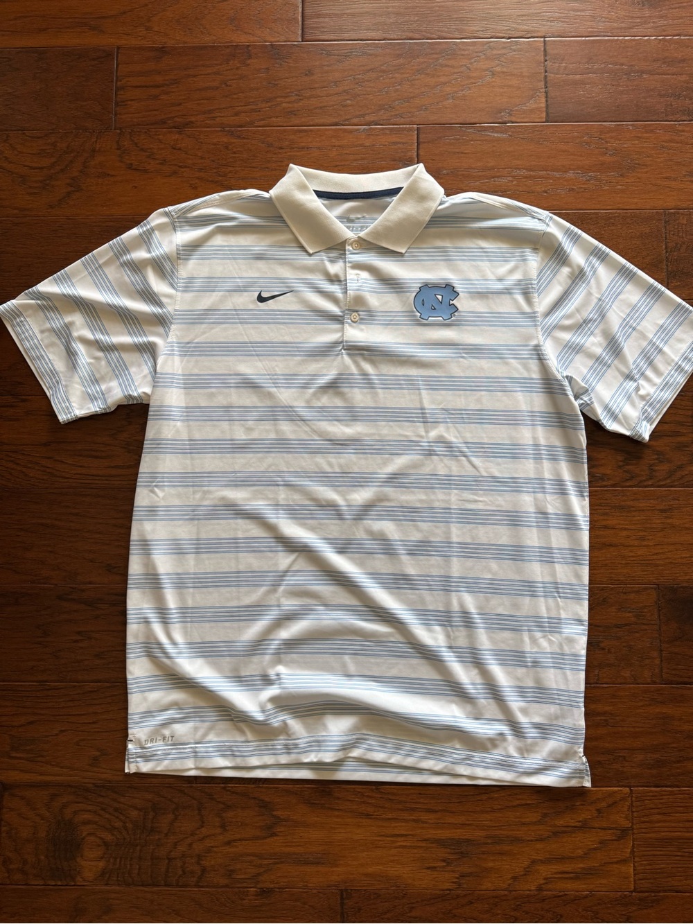 Nike Men’s White & Light Blue Striped Polo with UNC Logo